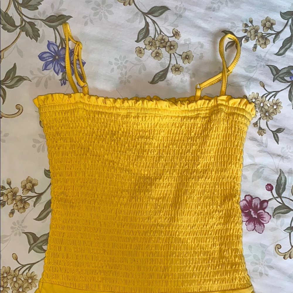 Cute frilly yellow bodysuit